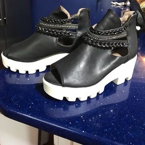 Never worn black and white high style booties
